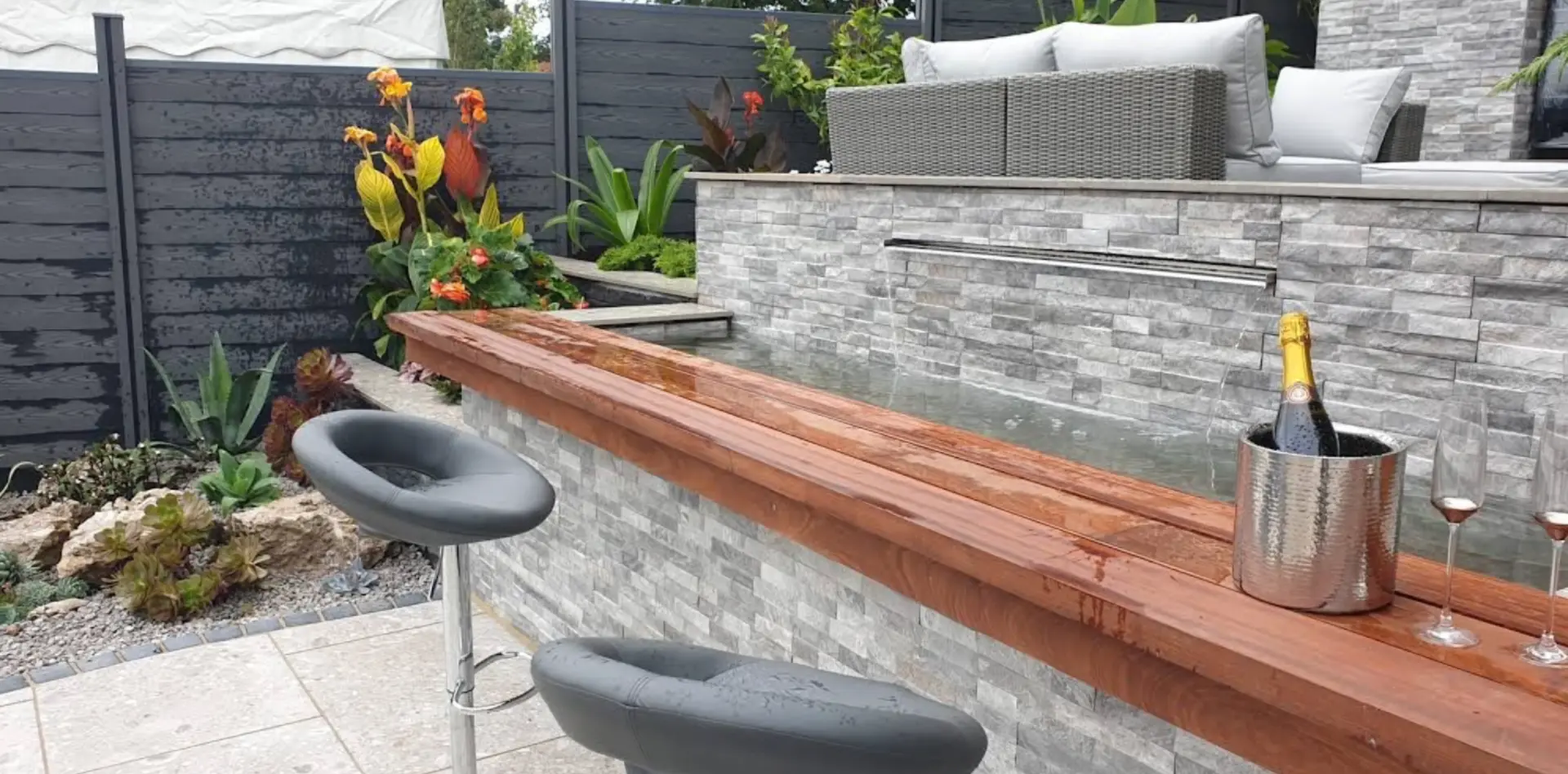 Rose Gardens bespoke landscaping detail with stonework, planting and water feature